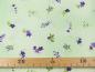 Preview: Patchworkstoff mit kleine lila Blüten auf pastellgrün mit Maß Detailansicht